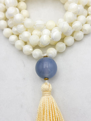 mother of pearl gemstone mala with chalcedony guru bead and pale yellow tassel | radiant malas | handmade in boulder, colorado