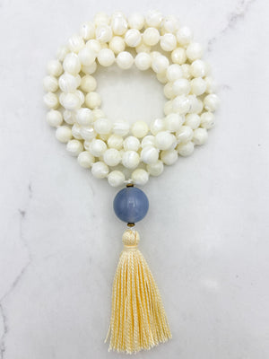 mother of pearl gemstone mala with chalcedony guru bead and pale yellow tassel | radiant malas | handmade in boulder, colorado