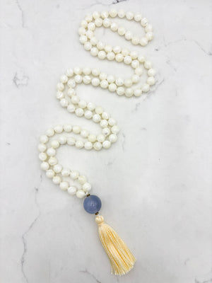 mother of pearl gemstone mala with chalcedony guru bead and pale yellow tassel | radiant malas | handmade in boulder, colorado