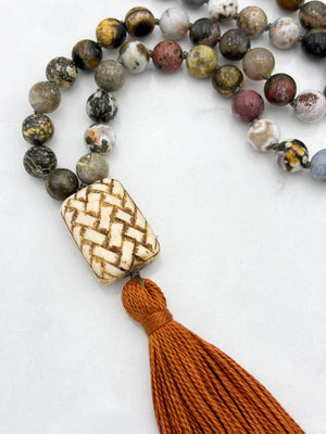 ocean jasper gemstone mala with basketweave carved bone guru bead and rust tassel | radiant malas | handmade in boulder, colorado