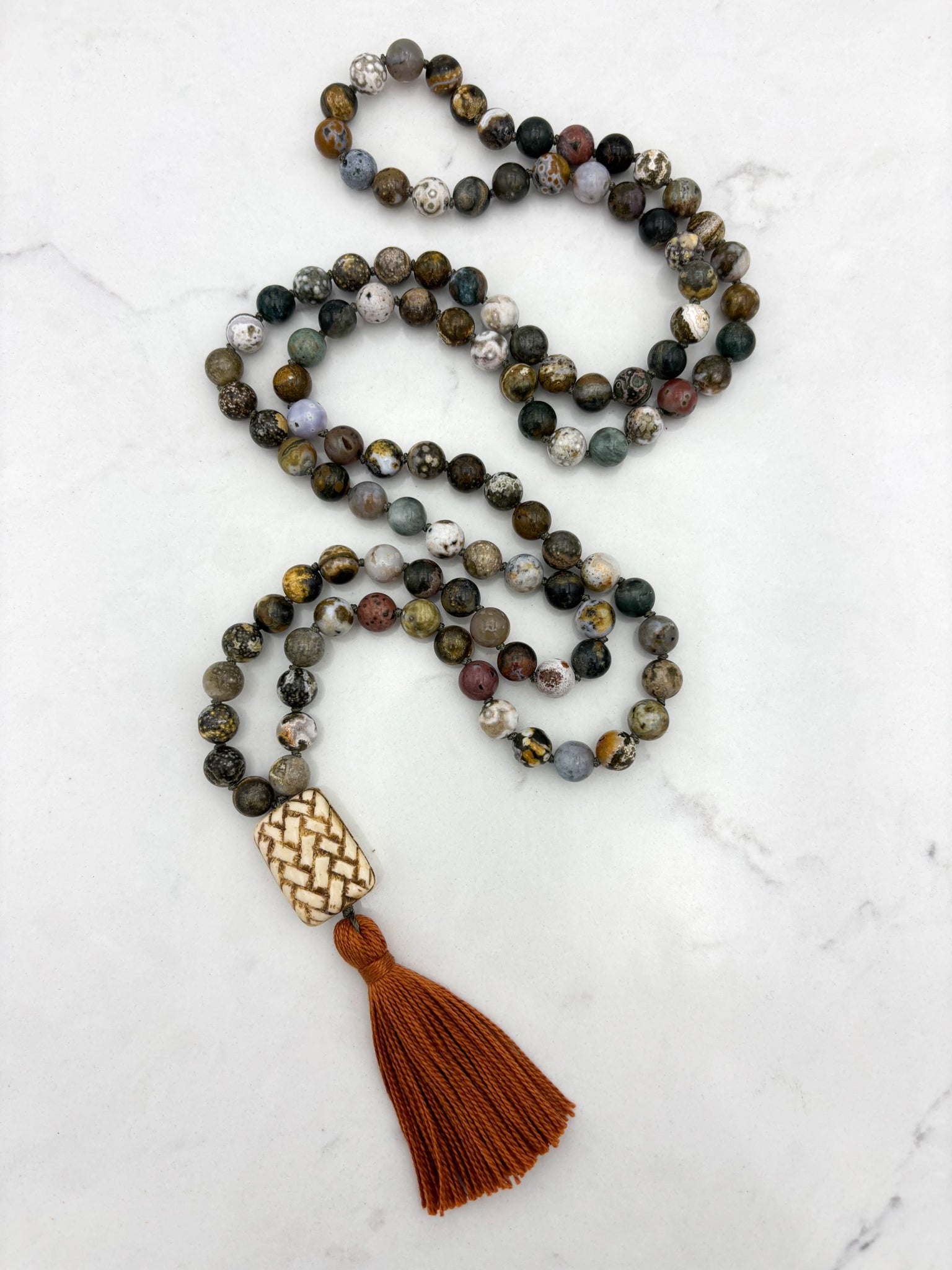 ocean jasper gemstone mala with basketweave carved bone guru bead and rust tassel | radiant malas | handmade in boulder, colorado