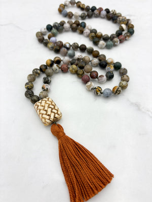 ocean jasper gemstone mala with basketweave carved bone guru bead and rust tassel | radiant malas | handmade in boulder, colorado