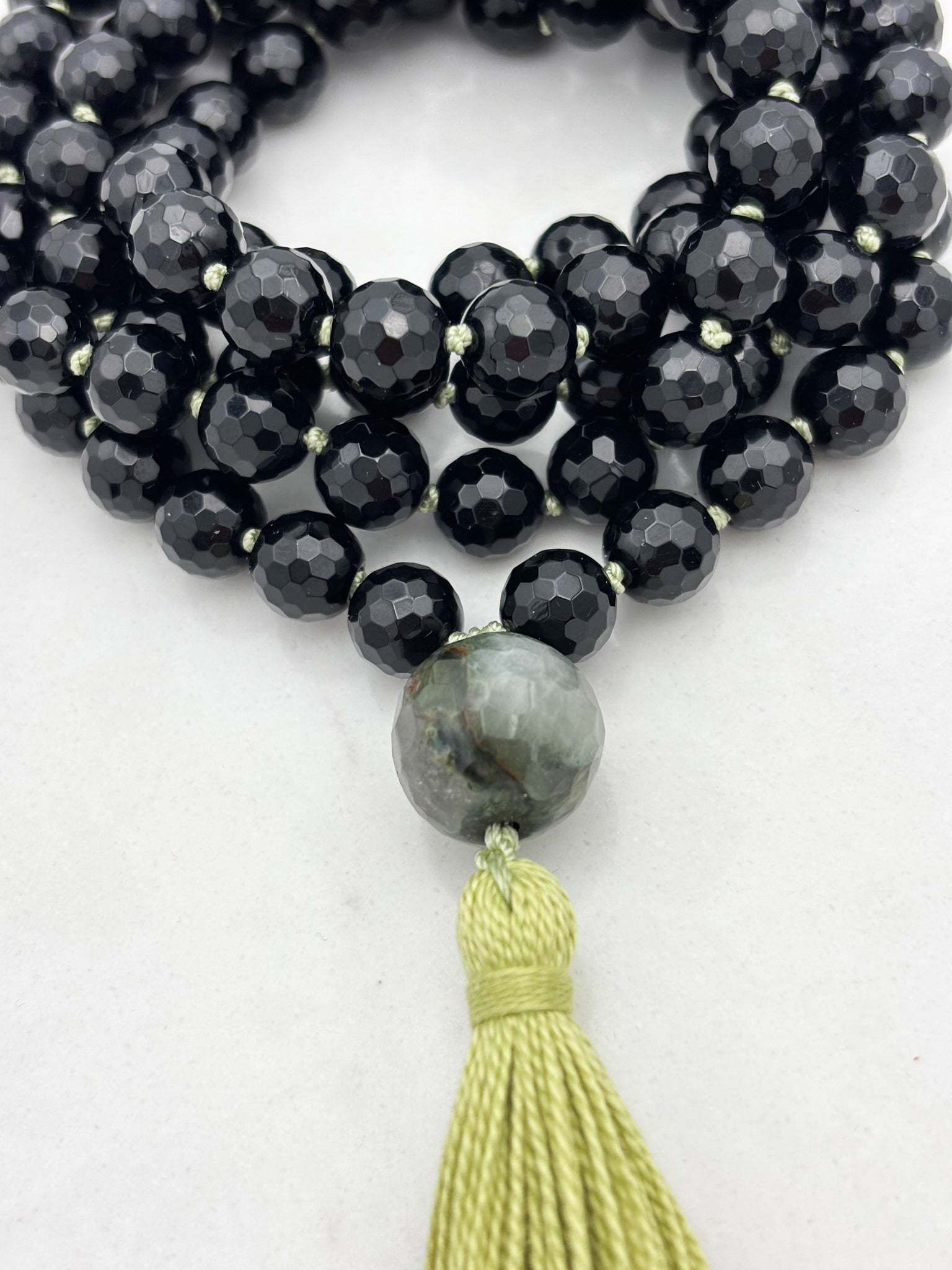 onyx gemstone mala necklace with moss agate guru bead and green tassel | radiant malas | handmade in boulder, colorado