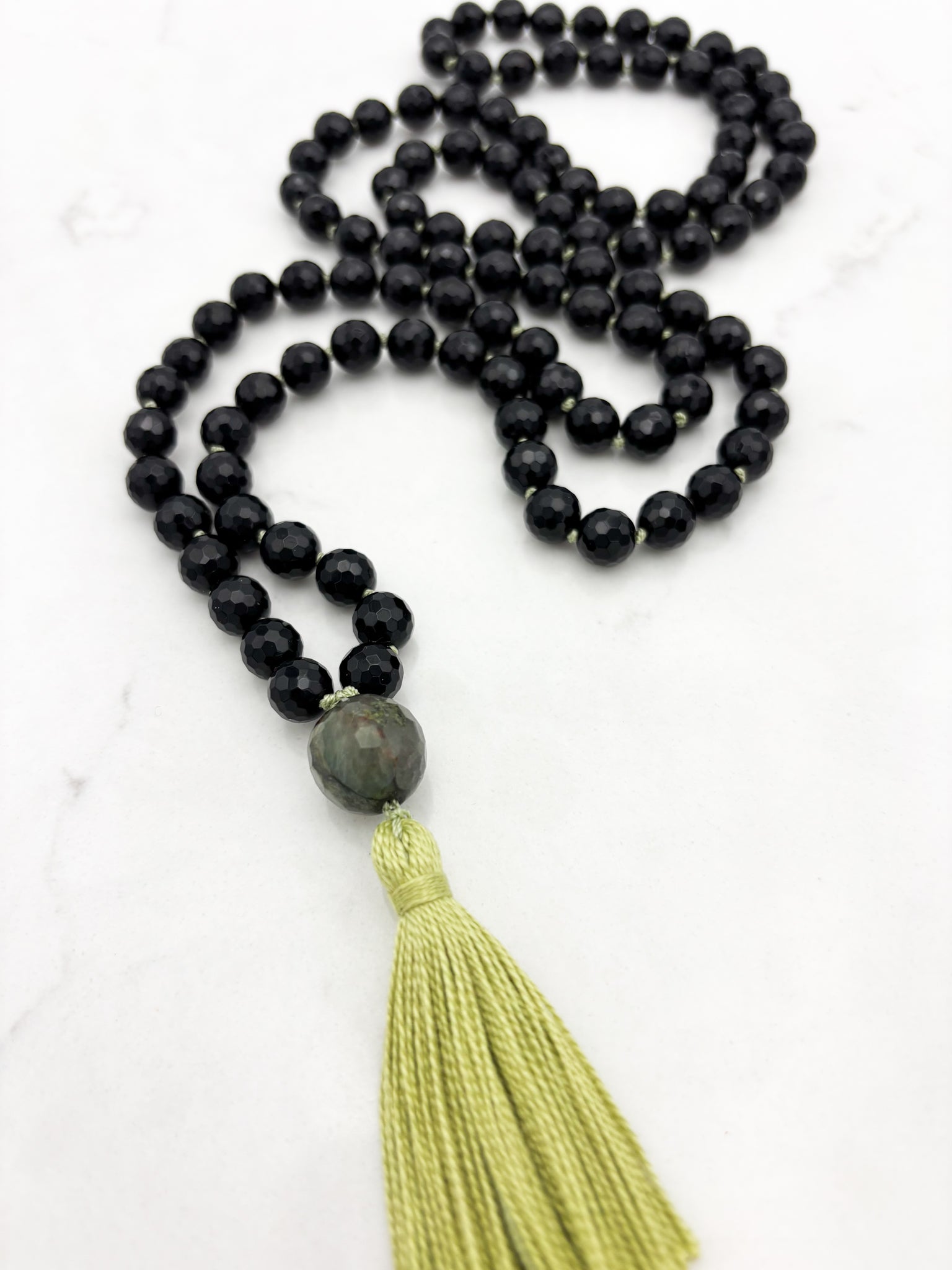 onyx gemstone mala necklace with moss agate guru bead and green tassel | radiant malas | handmade in boulder, colorado