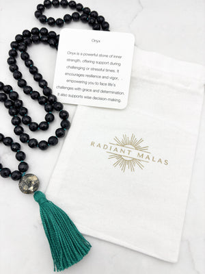 onyx gemstone mala with pyrite guru bead and green tassel | radiant malas | handmade in boulder, colorado