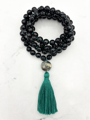 onyx gemstone mala with pyrite guru bead and green tassel | radiant malas | handmade in boulder, colorado