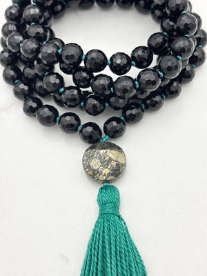 onyx gemstone mala with pyrite guru bead and green tassel | radiant malas | handmade in boulder, colorado
