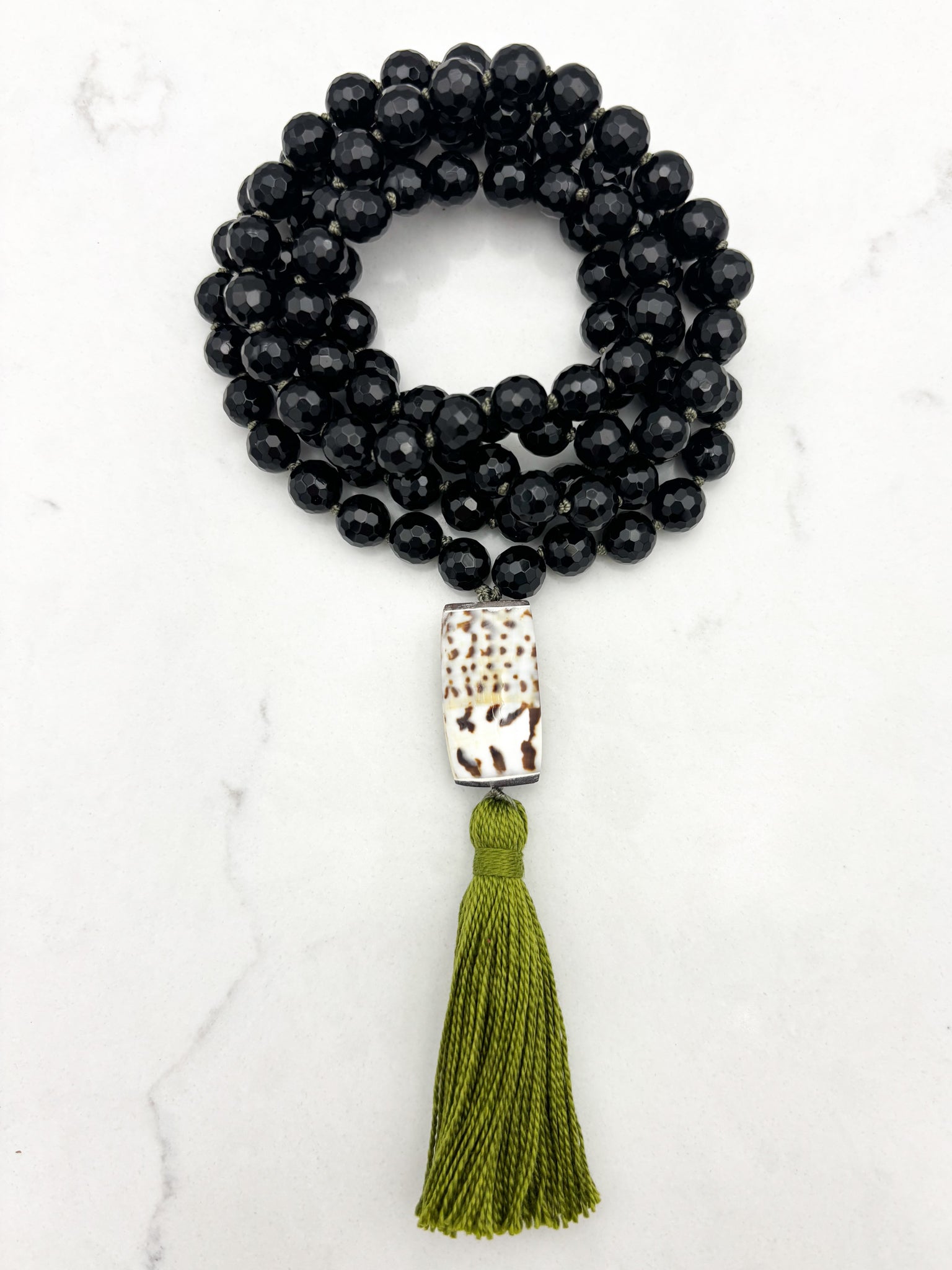 onyx gemstone mala with shell guru bead and green tassel | radiant malas | handmade in boulder, colorado