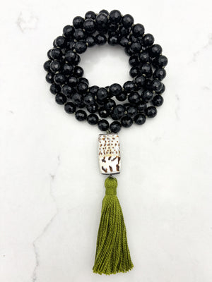 onyx gemstone mala with shell guru bead and green tassel | radiant malas | handmade in boulder, colorado