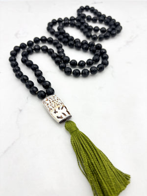 onyx gemstone mala with shell guru bead and green tassel | radiant malas | handmade in boulder, colorado