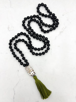 onyx gemstone mala with shell guru bead and green tassel | radiant malas | handmade in boulder, colorado