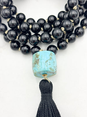 onyx gemstone mala with turquoise barrel guru bead and black tassel | radiant malas | handmade in boulder, colorado