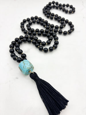 onyx gemstone mala with turquoise barrel guru bead and black tassel | radiant malas | handmade in boulder, colorado