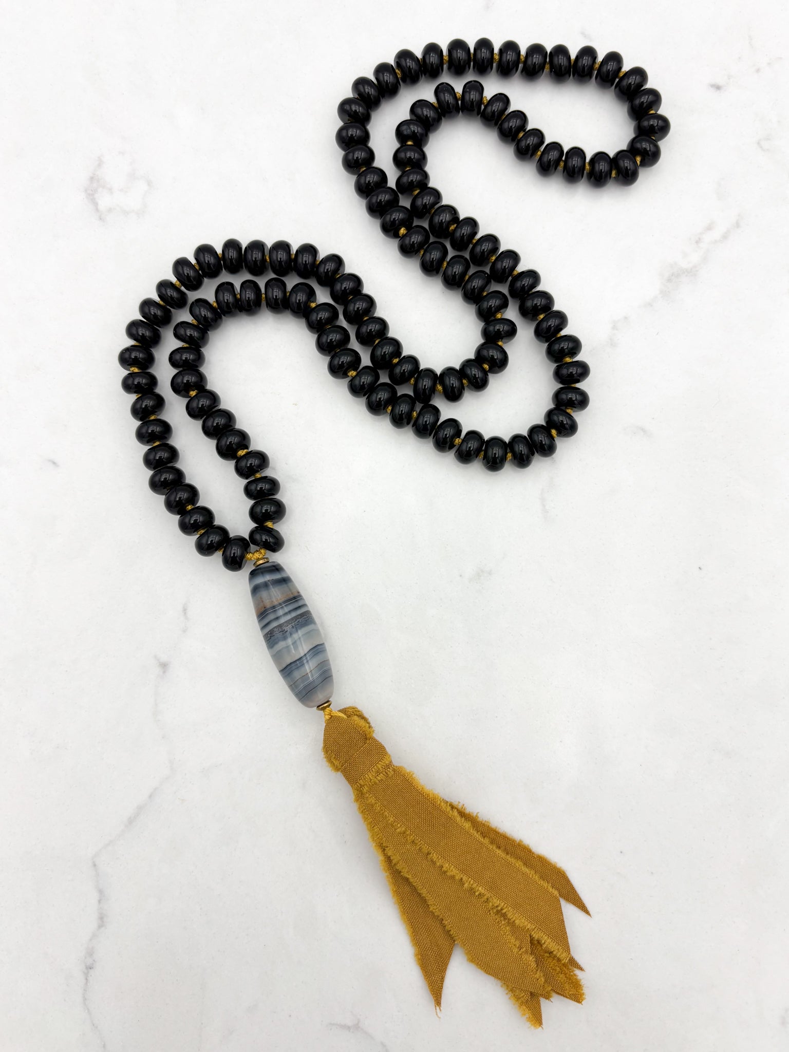 onyx gemstone mala with agate guru bead and silk ribbon tassel  radiant malas | handmade in boulder, colorado
