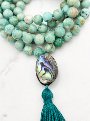 peruvian turquoise gemstone mala with abalone shell guru bead and dark green tassel | handmade in boulder, colorado | radiant malas