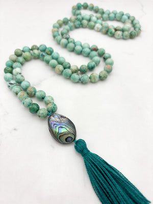 peruvian turquoise gemstone mala with abalone shell guru bead and dark green tassel | handmade in boulder, colorado | radiant malas