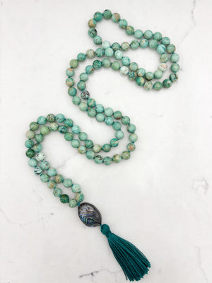 peruvian turquoise gemstone mala with abalone shell guru bead and dark green tassel | handmade in boulder, colorado | radiant malas