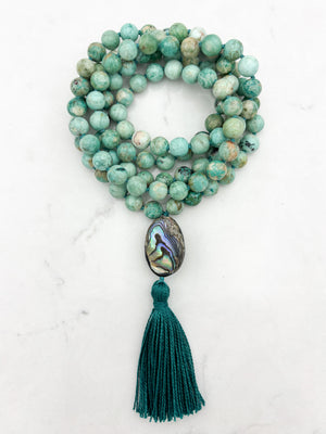 peruvian turquoise gemstone mala with abalone shell guru bead and dark green tassel | handmade in boulder, colorado | radiant malas