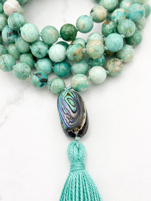 Peruvian Turquoise mala necklace with abalone shell guru bead and light green tassel | radiant malas | handmade in boulder, colorado