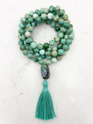 Peruvian Turquoise mala necklace with abalone shell guru bead and light green tassel | radiant malas | handmade in boulder, colorado