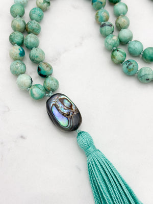 Peruvian Turquoise mala necklace with abalone shell guru bead and light green tassel | radiant malas | handmade in boulder, colorado