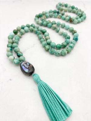 Peruvian Turquoise mala necklace with abalone shell guru bead and light green tassel | radiant malas | handmade in boulder, colorado