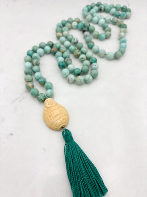 peruvian turquoise gemstone mala with carved bone buddha guru bead and green tassel | handmade in boulder, colorado | radiant malas