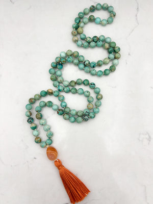 Peruvian Turquoise mala necklace with botswana agate guru bead and orange tassel | radiant malas | handmade in boulder, colorado
