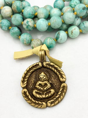 Peruvian Turquoise mala necklace with brass Buddha pendant | radiant malas | handmade in boulder, colorado