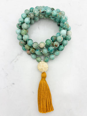 Peruvian Turquoise mala necklace with bone flower-carved guru bead and gold tassel | radiant malas | handmade in boulder, colorado