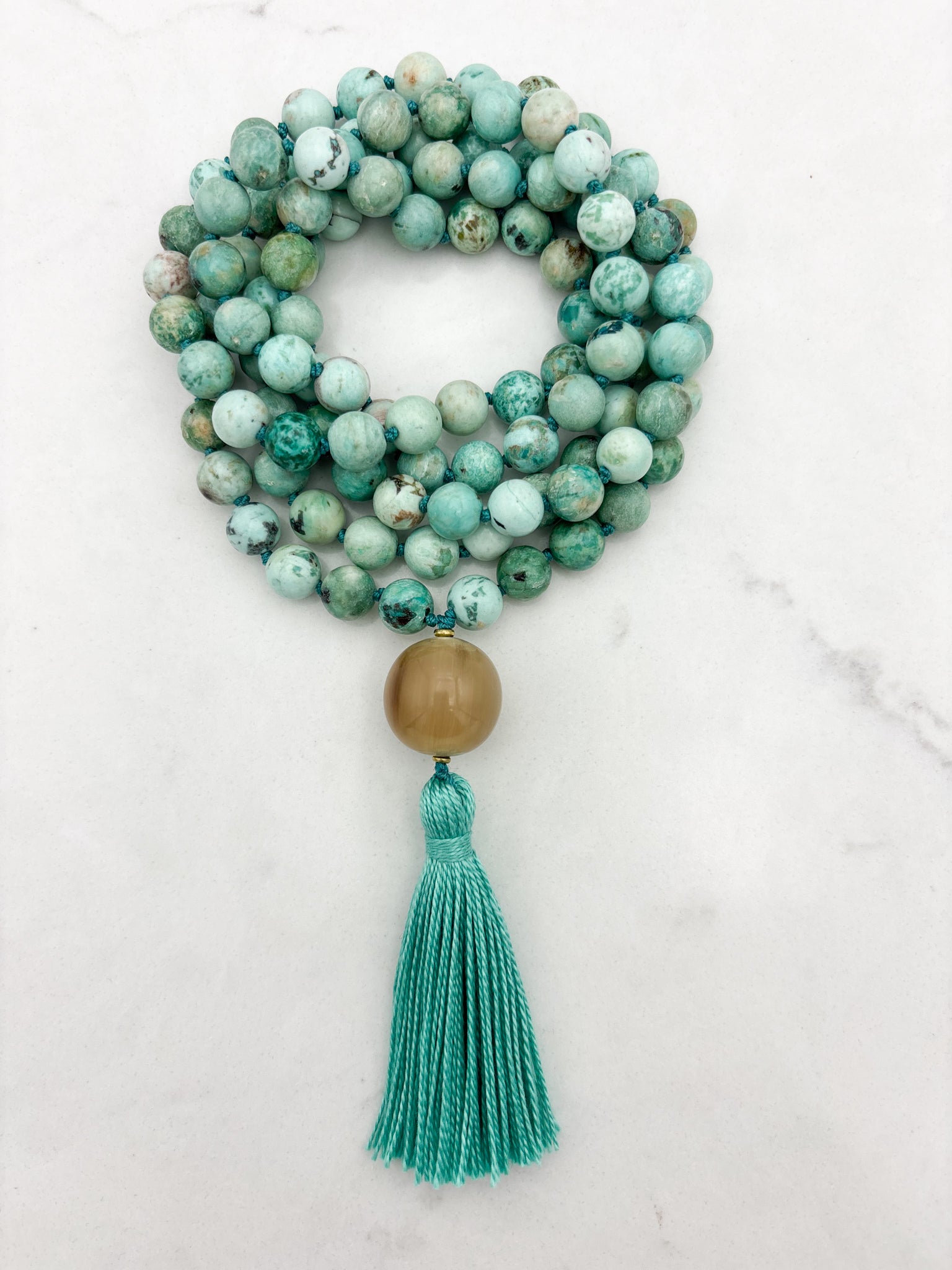 peruvian turquoise gemstone mala with polished horn guru bead and green tassel | handmade in boulder, colorado | radiant malas