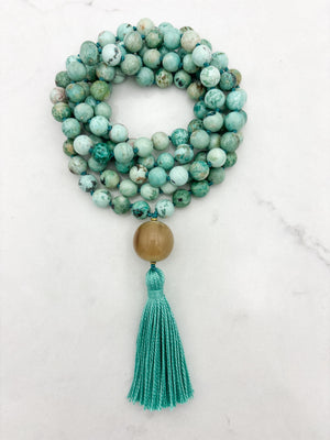peruvian turquoise gemstone mala with polished horn guru bead and green tassel | handmade in boulder, colorado | radiant malas