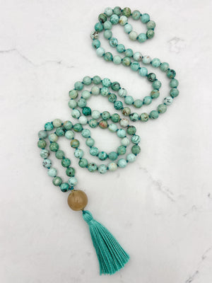peruvian turquoise gemstone mala with polished horn guru bead and green tassel | handmade in boulder, colorado | radiant malas