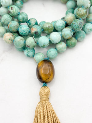 Peruvian Turquoise mala necklace with tiger's eye guru bead and light gold tassel | radiant malas | handmade in boulder, colorado