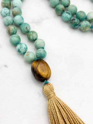 Peruvian Turquoise mala necklace with tiger's eye guru bead and light gold tassel | radiant malas | handmade in boulder, colorado