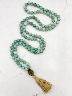 Peruvian Turquoise mala necklace with tiger's eye guru bead and light gold tassel | radiant malas | handmade in boulder, colorado