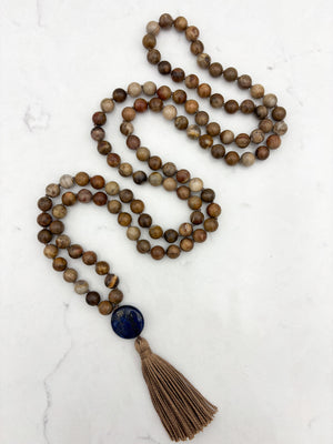 petrified wood gemstone mala with lapis guru bead and tan tassel | radiant malas | handmade in boulder, colorado