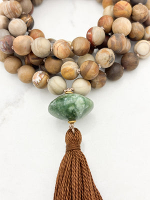 petrified wood gemstone mala with seraphinite guru bead and brown tassel | radiant malas | handmade in boulder, colorado