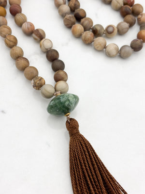 petrified wood gemstone mala with seraphinite guru bead and brown tassel | radiant malas | handmade in boulder, colorado