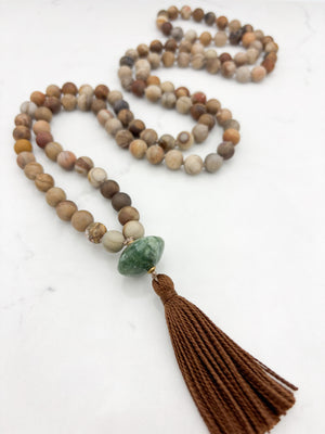 petrified wood gemstone mala with seraphinite guru bead and brown tassel | radiant malas | handmade in boulder, colorado