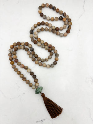 petrified wood gemstone mala with seraphinite guru bead and brown tassel | radiant malas | handmade in boulder, colorado