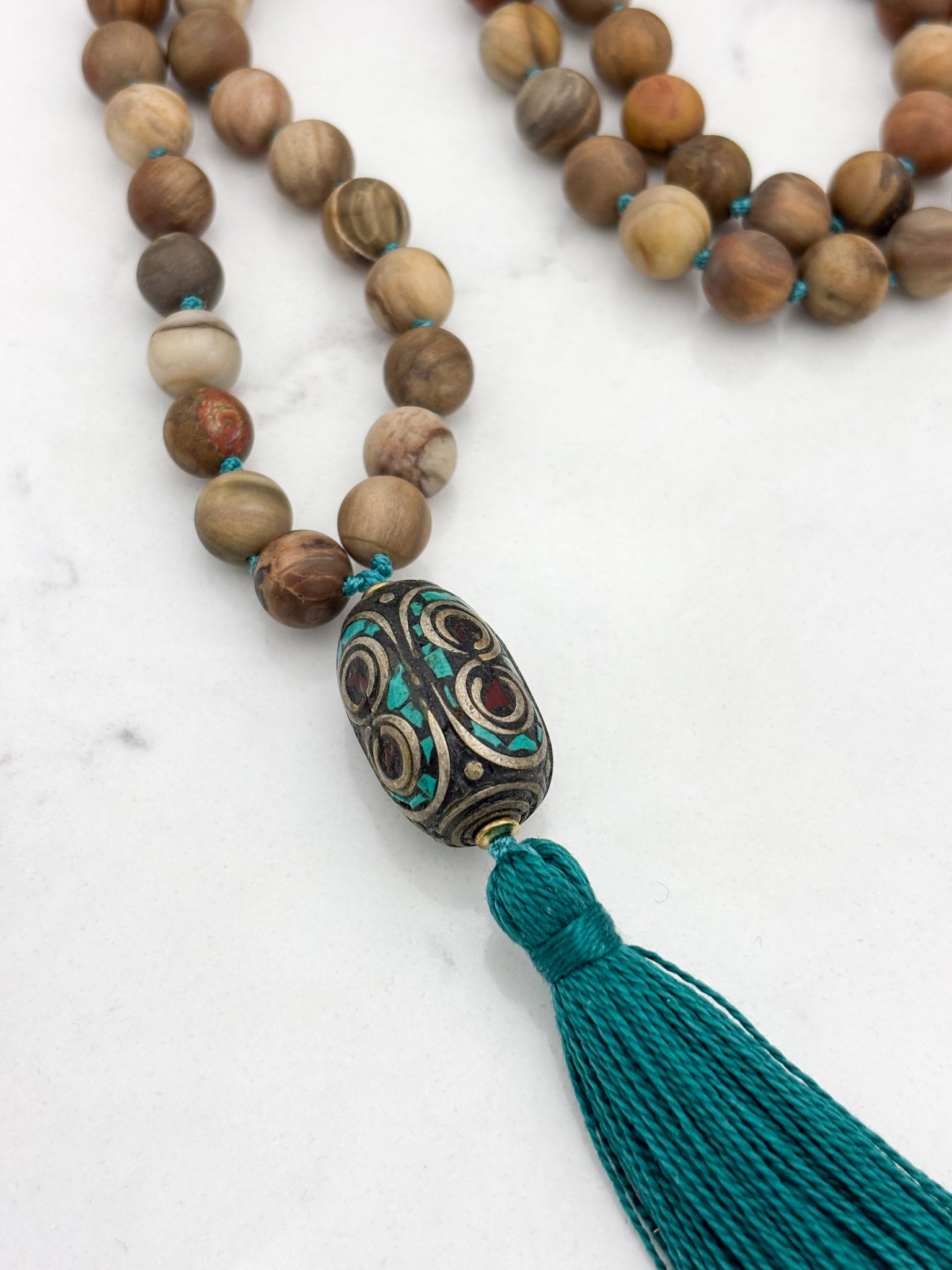 petrified wood gemstone mala with vintage brass and turquoise guru bead and turquoise tassel | radiant malas | handmade in boulder, colorado