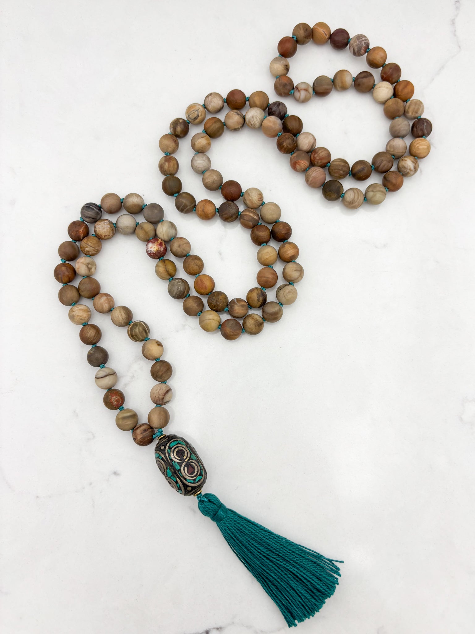 petrified wood gemstone mala with vintage brass and turquoise guru bead and turquoise tassel | radiant malas | handmade in boulder, colorado
