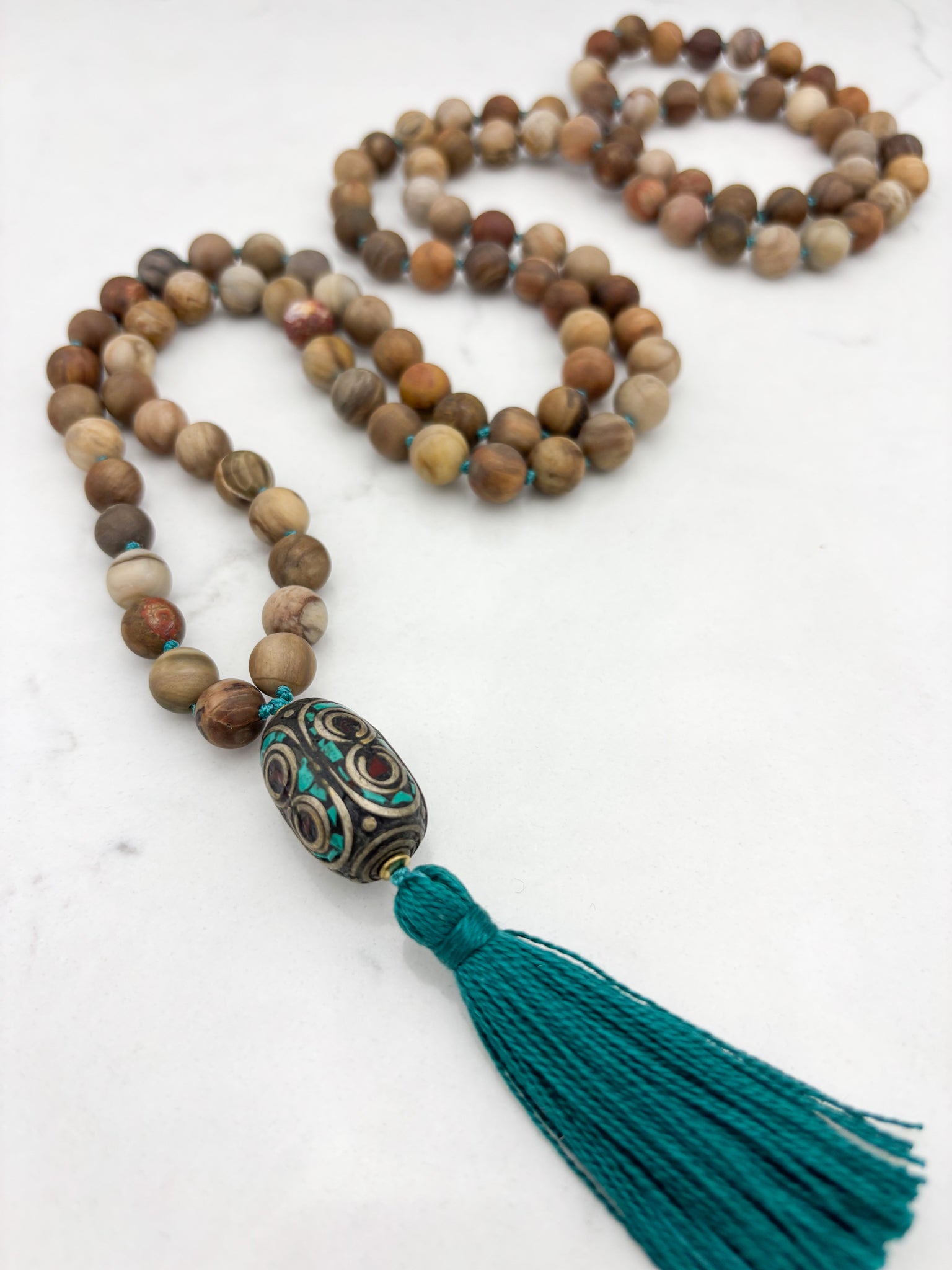 petrified wood gemstone mala with vintage brass and turquoise guru bead and turquoise tassel | radiant malas | handmade in boulder, colorado