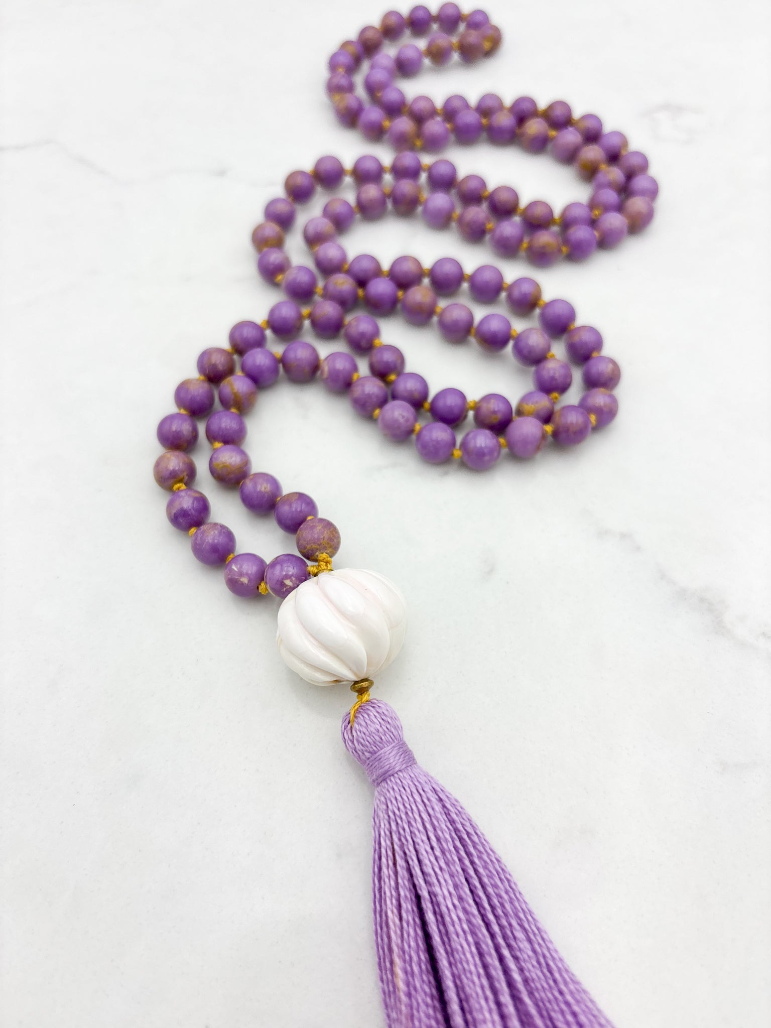 phosphosiderite gemstone mala with shell guru bead and purple tassel | radiant malas | handmade in boulder, colorado