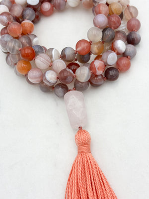 pink botswana agate gemstone mala with rose quartz guru bead and coral colored tassel | radiant malas | handmade in boulder, colorado