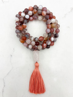 pink botswana agate gemstone mala with rose quartz guru bead and coral colored tassel | radiant malas | handmade in boulder, colorado
