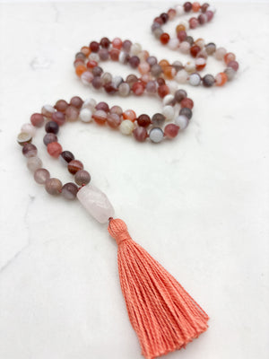 pink botswana agate gemstone mala with rose quartz guru bead and coral colored tassel | radiant malas | handmade in boulder, colorado