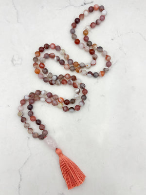 pink botswana agate gemstone mala with rose quartz guru bead and coral colored tassel | radiant malas | handmade in boulder, colorado