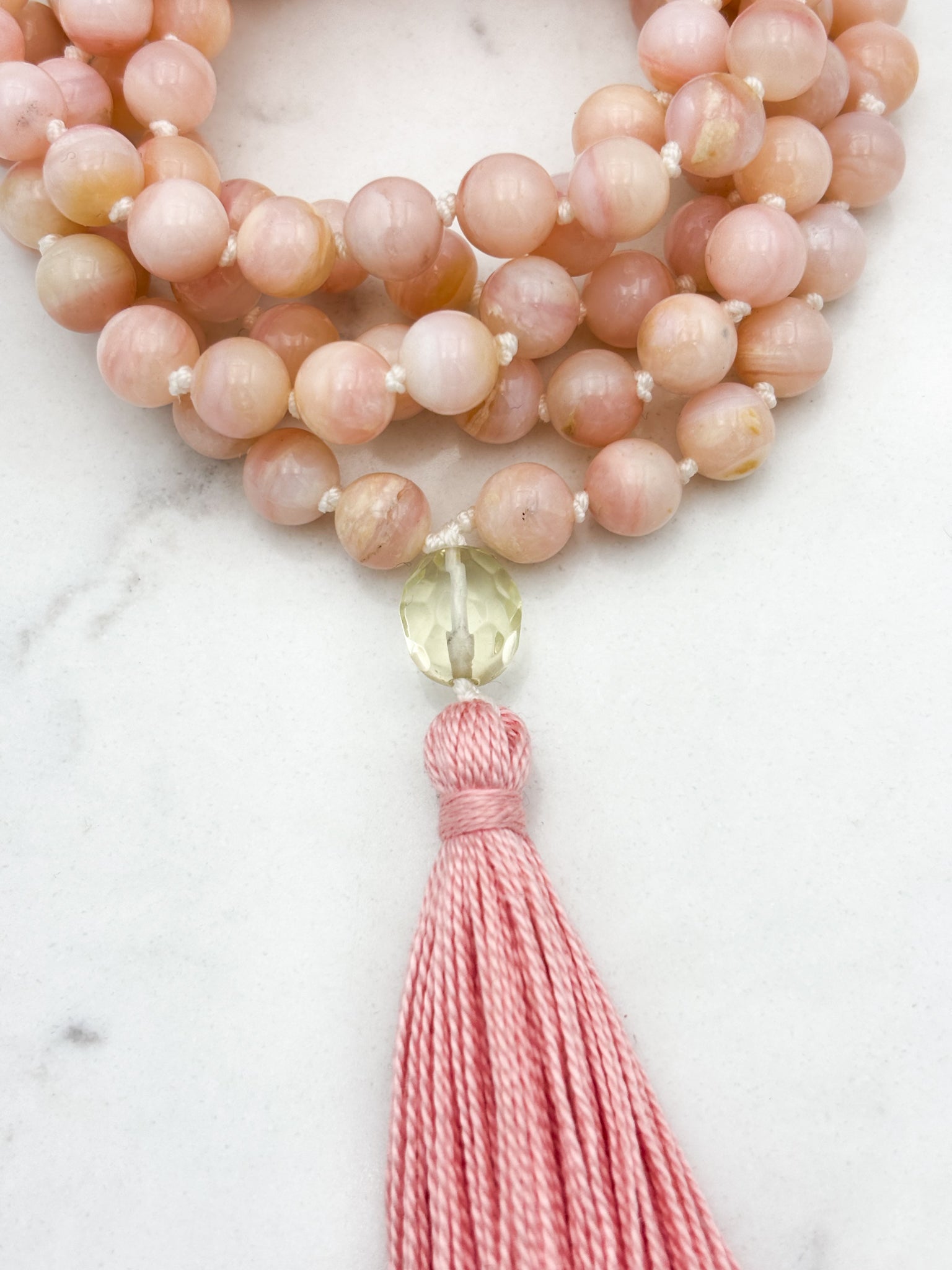 pink opal gemstone mala with faceted lemon quartz guru bead and rose colored tassel | radiant malas | handmade in boulder, colorado